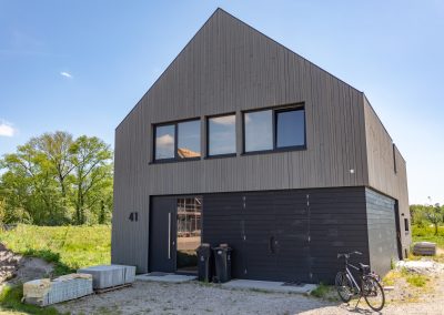 Woonhuis met Essen gevelbekleding