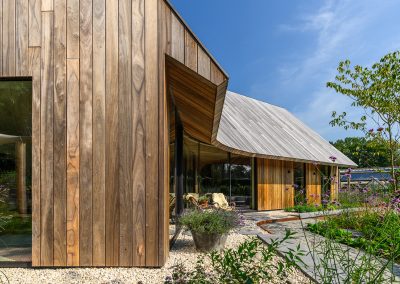 Woning bekleed met Padouk gevelbekleding