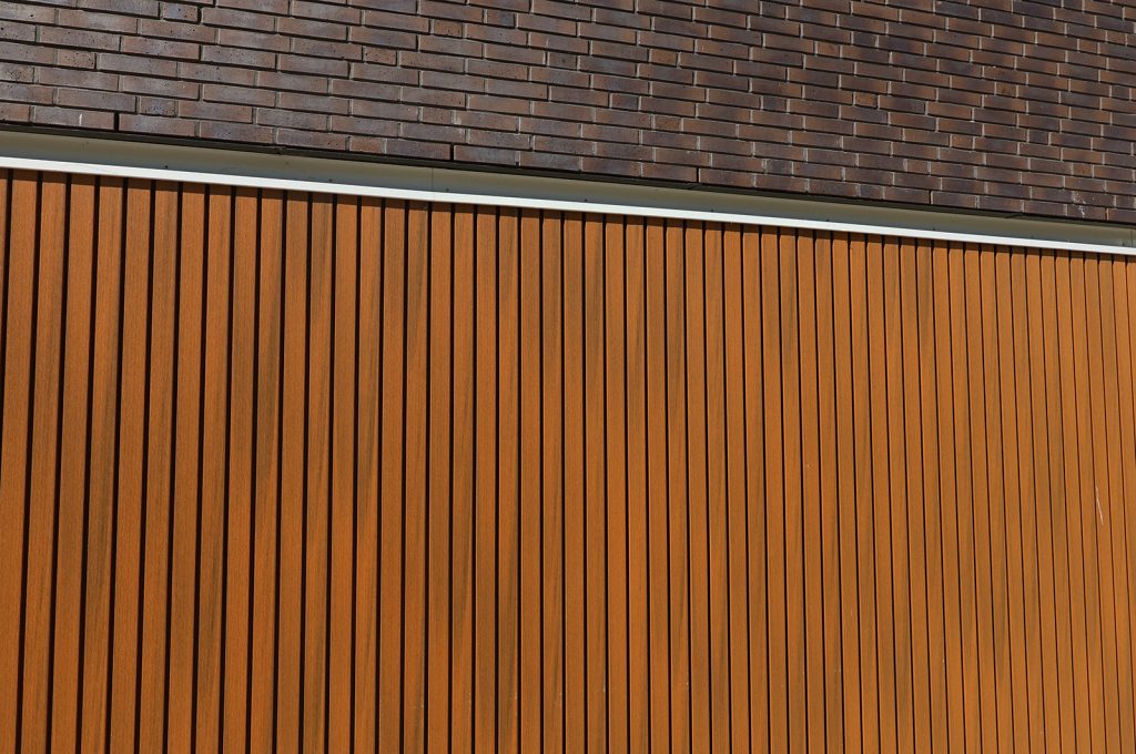 Kunststof gevelbekleding Teak kleur