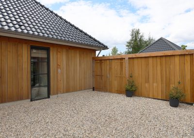 Woning en schutting van Thermo Ayous